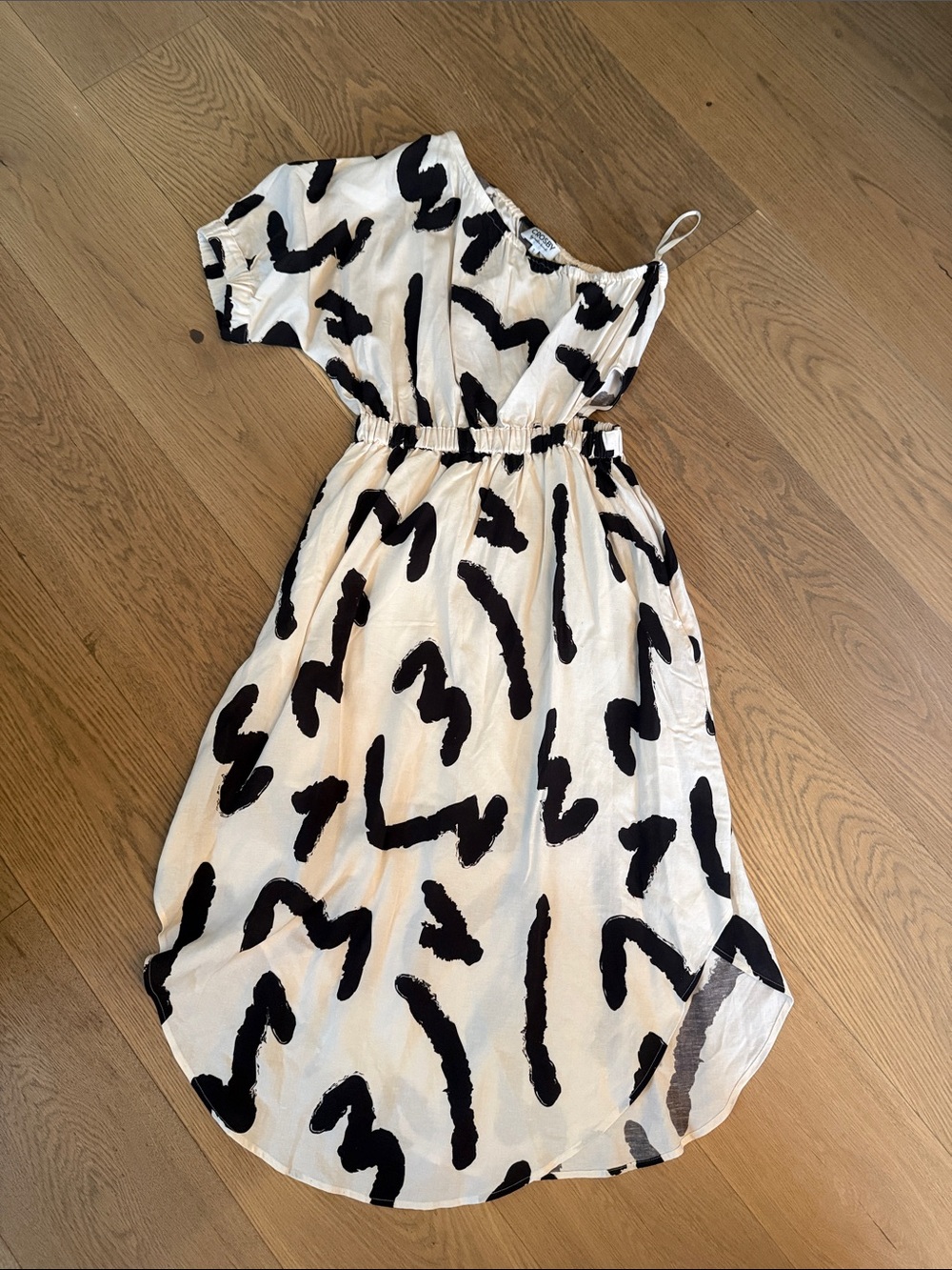 CROSBY by Mollie Burch One-Shoulder Cream Dress with Black Brushstroke Print